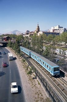 Metro Prints: The Metro train alongside a road in Santiago, Chile, South America