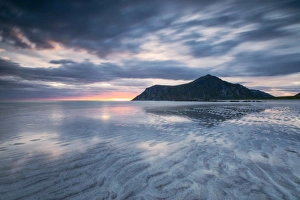 Nordland County Gallery: Midnight sun and clouds reflected in the clear water of sea Skagsanden, Flakstad