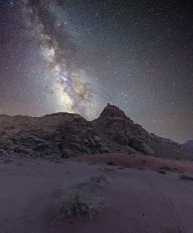 Star Prints: Milky Way core rising over a peak in the Wadi Rum desert, Jordan, Middle East