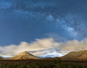 Spiral Galaxy Prints: Milky Way in the night sky over Montana del Fronton mountain, La Oliva, Fuerteventura