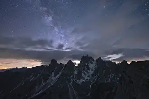 Milky Way and stars over the sharp pinnacles of Cadini di Misurina, Dolomites