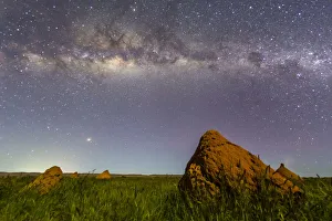 The Milky Way over termite mounds in Cape Range National Park, Exmouth, Western Australia, Australia, Pacific