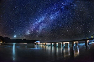 Jetties Collection: The Milky Way and Venus rise over the Hanalei Bay with the Hanalei Pier in the foreground