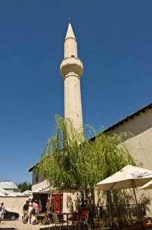 Minaret in the old town of Mostar, UNESCO World Heritage Site, Bosnia-Herzegovina, Europe