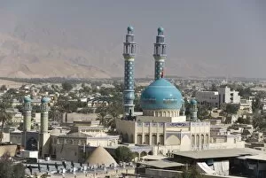 Minarets and dome of main mos que centre of des ert town, Lar city, Fars province