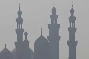 Images Dated 7th November 2009: The minarets of the mosques of the old city in the smog, Cairo, Egypt, North Africa