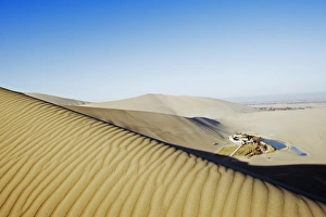 Images Dated 13th December 2008: Ming Sha sand dunes and pavilion at Crescent Moon Lake, Dunhuang, Gansu Province