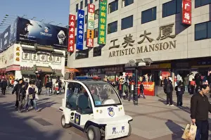 Mini sized police patrol car at Wangfujing shopping street, Beijing, China, Asia