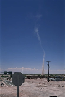Chilean Prints: Mini twister (dust devil) forms above town, San Pedro de Atacama, Chile, South America