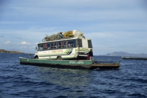 Minibus crossing Lake Titicaca on a ferry in Bolivia, South America