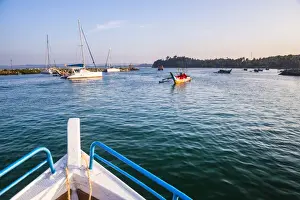 Typical Culture Prints: Mirissa harbour, whale watching boat heading out on a whale watching trip