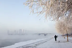Northeast China Prints: Mist rising off Songhua River and ice covered trees in winter, Jilin City