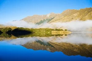Images Dated 8th April 2011: Misty dawn reflections on calm Lake Moke, Queenstown, Otago, South Island, New Zealand, Pacific
