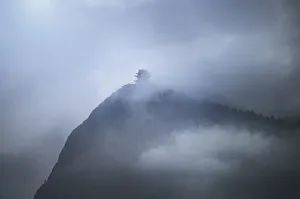 Sichuan Prints: Misty pagoda in the fog on top of Emeishan, Sichuan, China, Asia