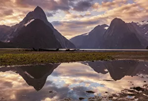 Moody Sky Gallery: Mitre Peak and Lion Peak sunset reflections, Milford Sound, Fiordland National Park
