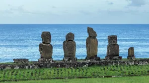 Ritual Prints: Moai statues stand at Ahu Tahai Ceremonial Complex against the ocean on Easter Island in Chile during a bright day
