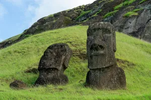 Depiction Prints: Moai statues stand on a grassy slope of Rano Raraku quarry on Easter Island in Chile