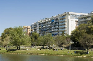 Flat Prints: Modern apartment blocks on the river Rio Guadalquivir