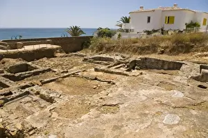 Apartments Prints: A modern apartment overlook the Roman ruins (the Ruinas Romanas da Luz) at Luz in Lagos