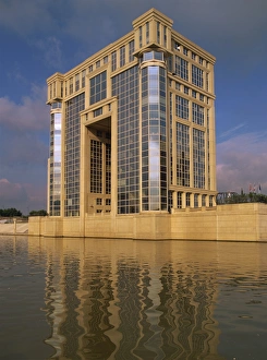 Montpellier Prints: Modern building, the Antigone complex, overlooking water, in Montpellier