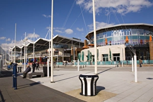 Portsmouth Prints: Modern buildings, restaurants and shops at Gunwharf Quays waterfront development in regenerated historic harbour