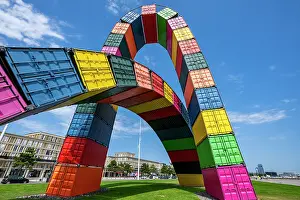 Public Prints: Modern design of colorful shipping containers forming an arch structure at a UNESCO site in Le Havre