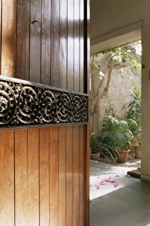 Ahmedabad Prints: A modern front door decorated with a 400 year old piece