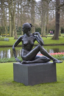 Nude Prints: Modern sculpture of a nude woman, Keukenhof, park and gardens near Amsterdam