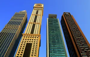 Skyscrapers Prints: Modern skyscrapers rise high in Central Dubai showcasing unique designs