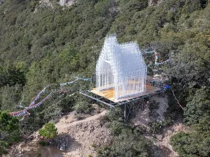 Meditation Prints: Modern white pavilion offers viewpoint of Meili Mountains with prayer flags in Yunnan