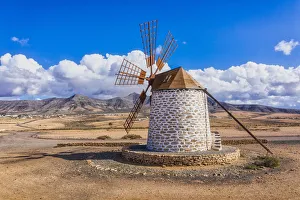 Stone Wall Prints: Molino de Tefia, traditional windmill in Tefia, Fuerteventura, Canary Islands, Spain
