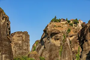 Thessaly Prints: Monastery on high rock formation surrounded by cliffs under clear sky in Greece