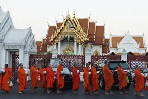 Wearing Prints: Monks collecting morning alms, The Marble Temple (Wat Benchamabophit), Bangkok, Thailand
