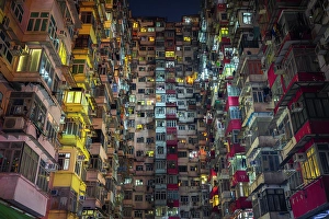 Crowded Prints: Monster Buildings illuminated at night, Quarry Bay, Hong Kong, China