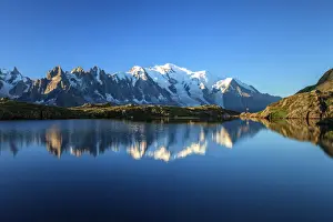 Mont Blanc, top of Europe, reflected during sunrise in Lac es Cheserys, Aiguilles Rouges Parc