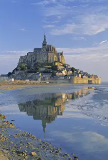 Mont St. Michel (Mont Saint-Michel) reflected in water, Manche, Normandy, France, Europe