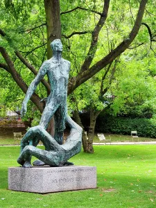 Honor Prints: Monument aux Etudiants Resistants in Jardin du Luxembourg stands tall in the green park of Paris honoring brave