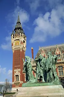 Monument to the burghers of Calais by Rodin, and the Hotel de Ville in Calais