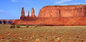 Trekking Prints: Monument Valley showcases red rock formations and open landscapes in the Navajo territory of Utah