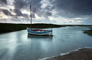 Moody Collection: A moody and windy summer evening at Brancaster Staithe, North Norfolk, England