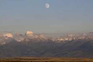 Images Dated 2nd September 2009: Full moon above the central Tian Shan mountain range, Kyrgyzstan, Central Asia, Asia