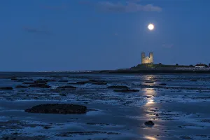 Nighttime Prints: Full moon rising over Reculver Towers, beach at low tide, Reculver, Herne Bay, Kent