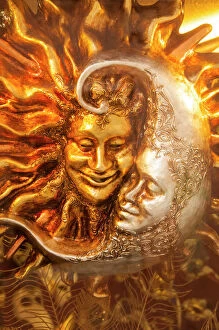 Typically Italian Gallery: Moon and Sun carnival mask decorations, Venice, Veneto, Italy, Europe