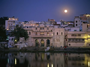 Udaipur Prints: Moonlit view of Gangaur Ghat, with old city gateway, Udaipur, Rajasthan state