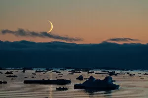 Moonrise at dusk in the Weddell Sea, Antarctica, Polar Regions