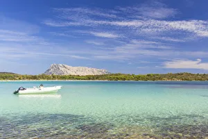 Moorings Prints: Moored boat at Cala Brandinchi