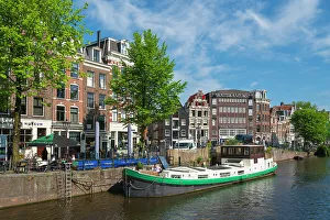 Amsterdam Prints: Moored boat on Prinsengracht canal, Amsterdam, The Netherlands, Europe