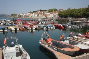 Vessels Prints: Moored boats at marina in Vilagarcia de Arousa with scenery of city and hills in Galicia Spain