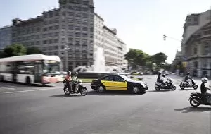 Mopeds, taxi and bus, Barcelona, Catalonia, Spain, Europe