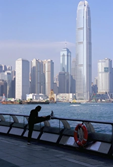 Exercising Prints: Morning exercise, Victoria Harbour and Two IFC Tower, Hong Kong, China, Asia